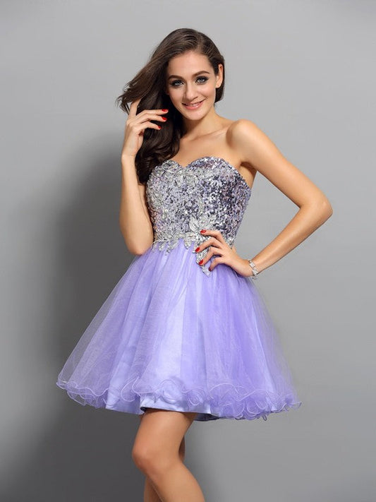 A-Line/Princess Homecoming Dresses Sweetheart Beading Applique Sleeveless Tess Short Net Cocktail Dresses