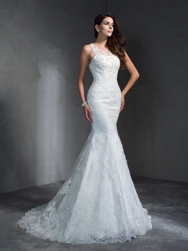 Long Sleeveless Scoop Applique Trumpet/Mermaid Lace Wedding Dresses