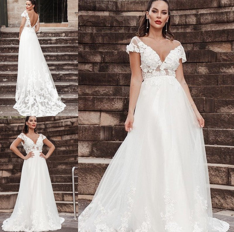 A-Line/Princess V-neck Sleeveless Tulle Sweep/Brush Applique Train Wedding Dresses