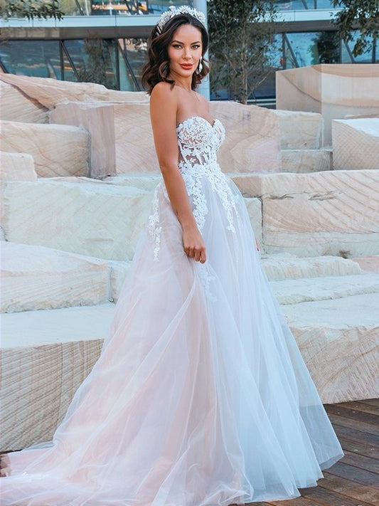 Sweetheart Sleeveless Tulle Sweep/Brush Applique A-Line/Princess Train Wedding Dresses