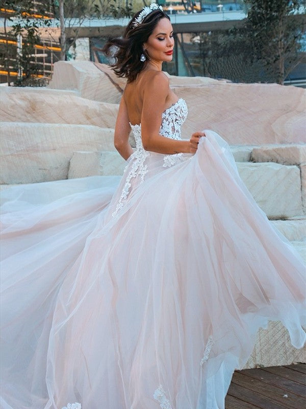 Sweetheart Sleeveless Tulle Sweep/Brush Applique A-Line/Princess Train Wedding Dresses