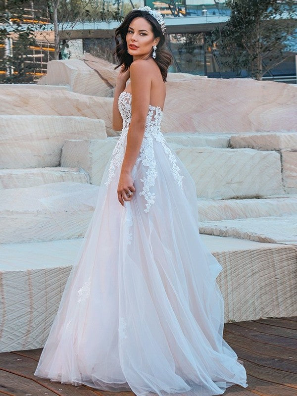 Sweetheart Sleeveless Tulle Sweep/Brush Applique A-Line/Princess Train Wedding Dresses