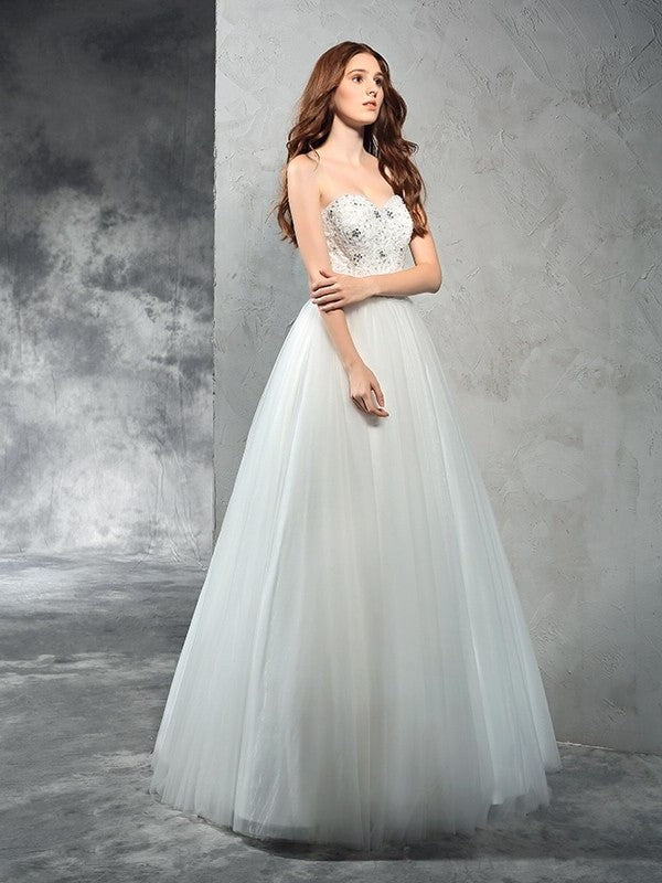 Sweetheart Sleeveless A-Line/Princess Long Beading Net Wedding Dresses