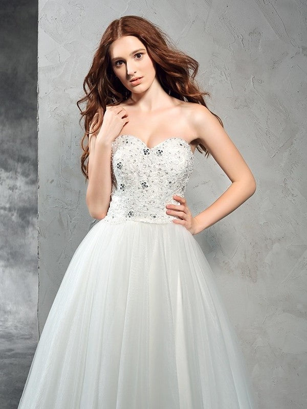 Sweetheart Sleeveless A-Line/Princess Long Beading Net Wedding Dresses